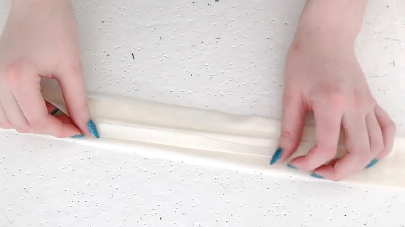 Attach the Neck Strap and Waist Ties